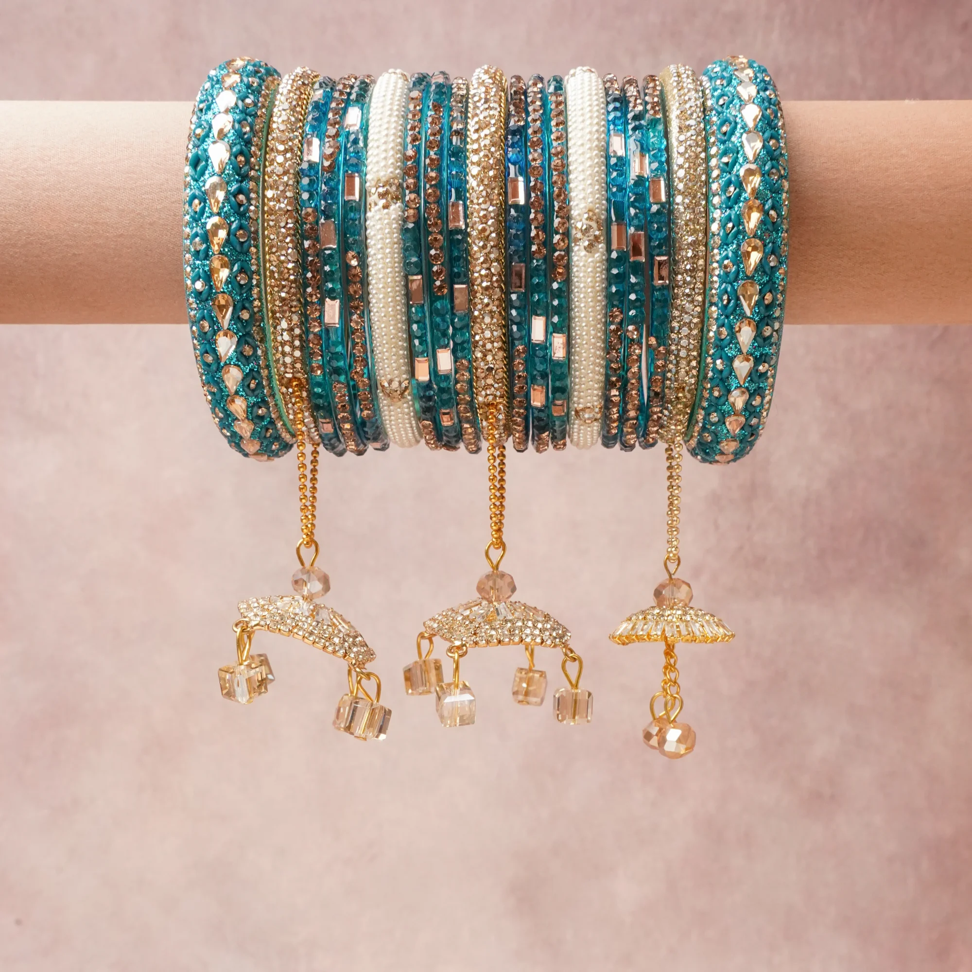 A commanding Teal anchors this beautiful set, enriched with accents of Gold, White, Rose Gold that add depth and dimension.

Featuring a striking composition of Glass, Rhinestones, Simulated Pearls, Gold-toned Metal, Enamel, Faceted Glass Beads, this set carries intricate craftsmanship and strong presence. Grand in form, it is created for moments that deserve to be marked.